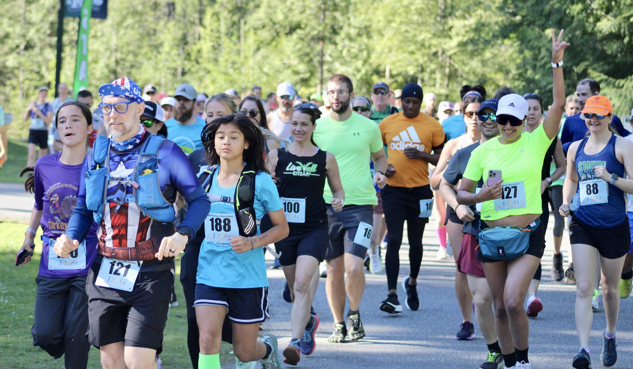 Elisha Meyer/Kitsap News Group photos
A crowd of over 100 runners take their first steps of the half marathon.
